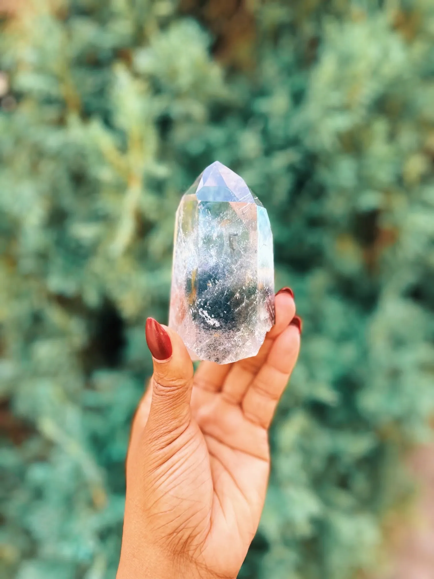 Quartz With Inclusion Half polished Point